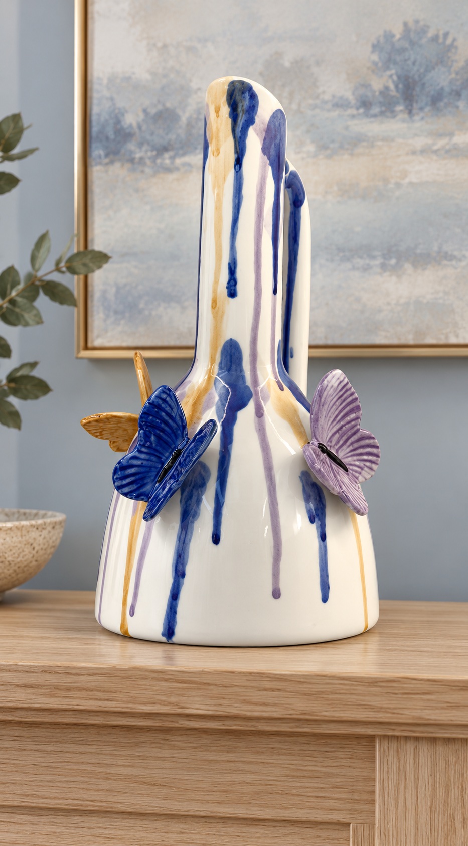 White Ceramic Vase with Elongated Neck and Raised Butterfly Details 4