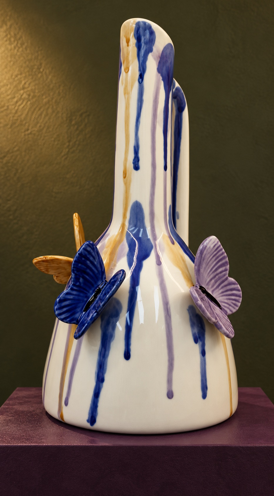 White Ceramic Vase with Elongated Neck and Raised Butterfly Details 5