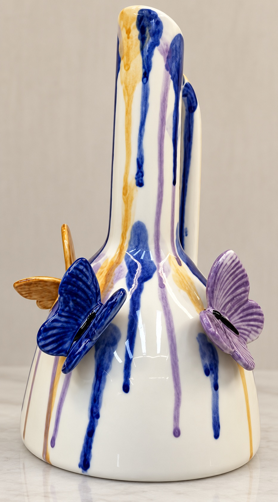 White Ceramic Vase with Elongated Neck and Raised Butterfly Details 3
