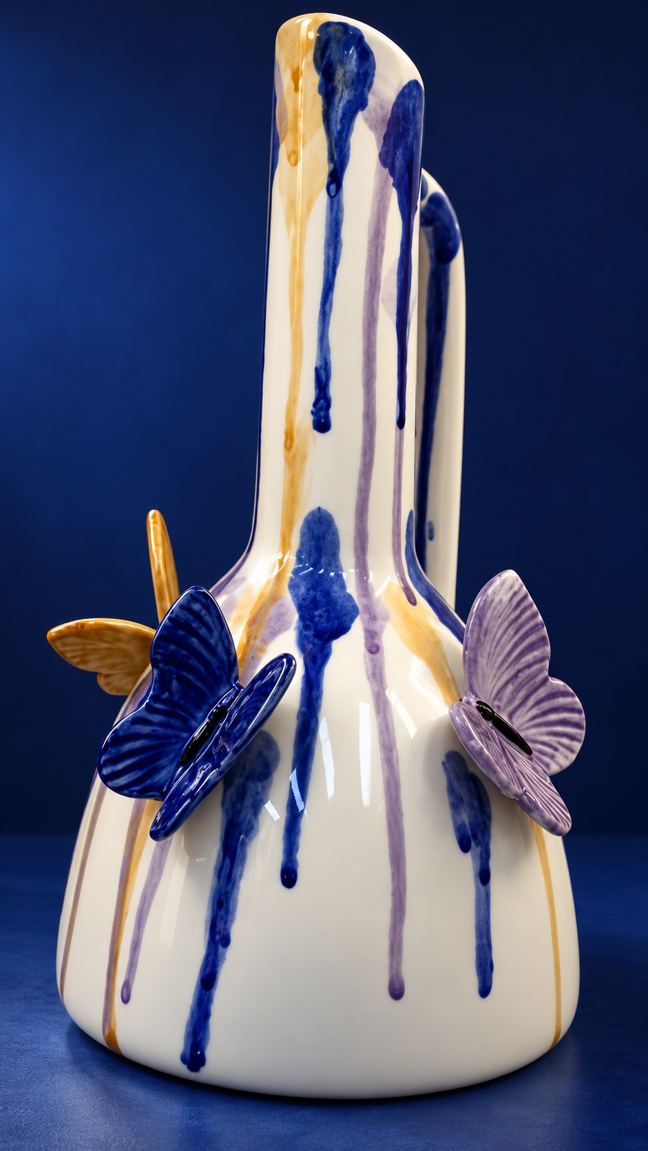 White Ceramic Vase with Elongated Neck and Raised Butterfly Details 2
